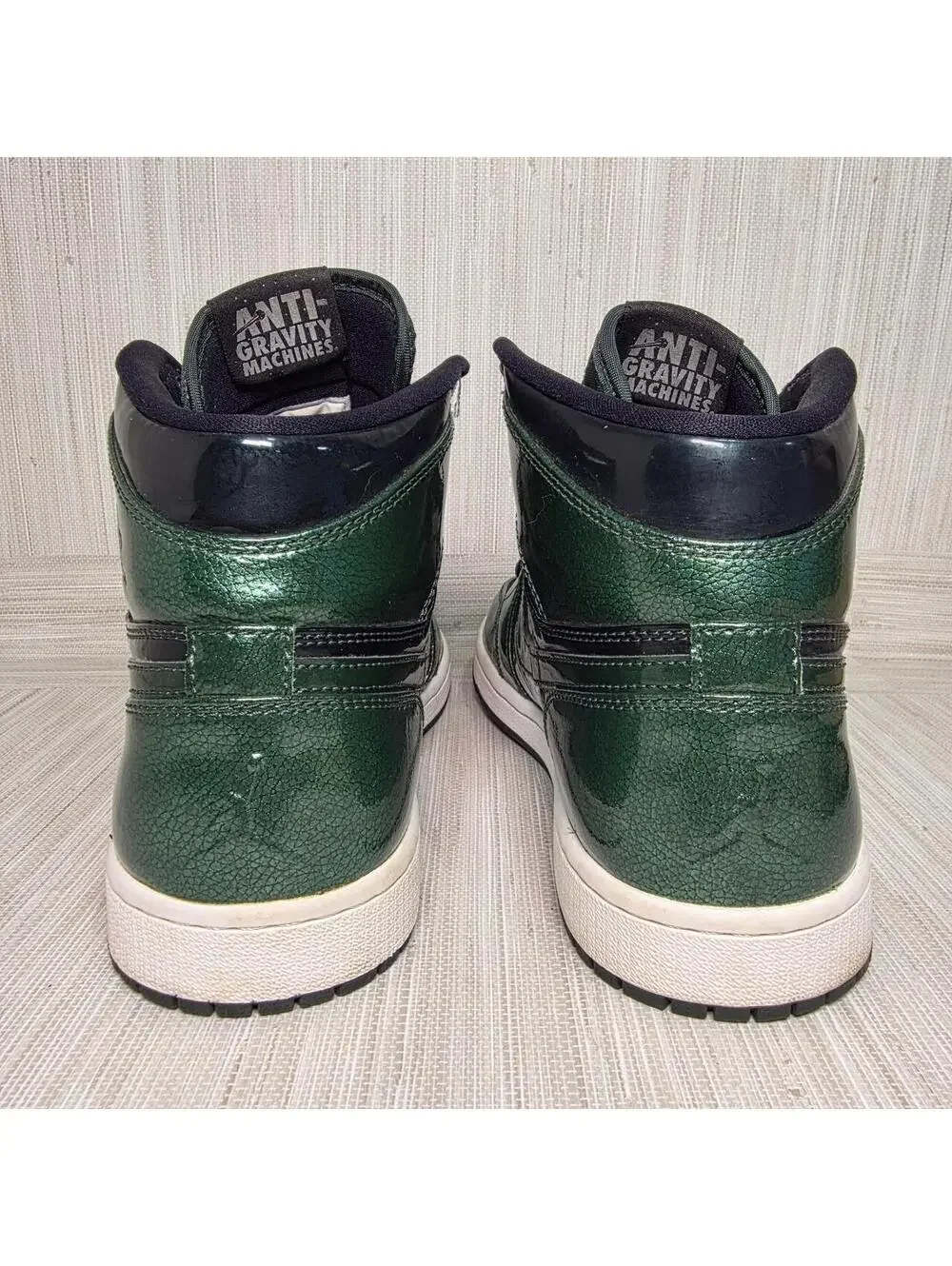 Nike Air Jordan 1 Retro High OG green trainers.